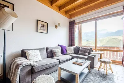 Image de Val Thorens - Duplex chaleureux avec cheminée, 3 chambres, pour 7 pers.