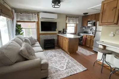 Paugus Bay Cottage waterfront cottage on private island! Walk to Paugus Bay Pub!