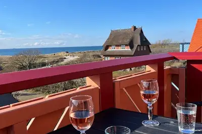 Image de Ferienwohnung Direkt Hinter der DĂĽne mit Meerblick