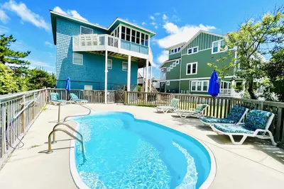 Image de As Good As It Gets -- Semi Of home in Duck with Pool and Ocean Views