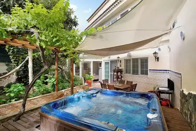 Image de Maison de vacances 'Duplex Carmelo Y Carmela' avec terrasse privée, jardin privé et Wi-Fi