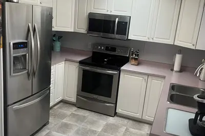 Image de Entire home to yourself, 7 minutes to down town! All amenities you would need