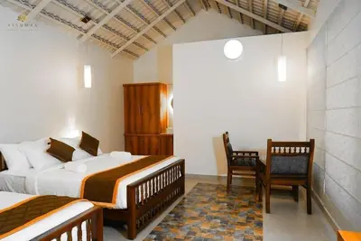 Image de Nestled amidst the forested slopes of Coorg, Vishmaa Resorts & Camping.