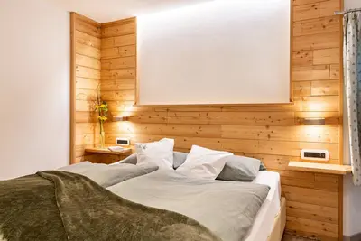 Image de Appartement 'Ciasa Majonade Pozza Di Fassa Tipo1' avec vue sur montagne, terrasse privée et Wi-Fi