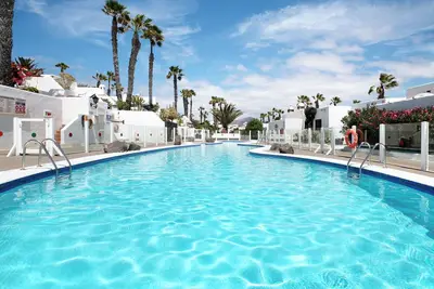 Image de Appartement de vacances 'Puerto Chico H' avec piscine partagée, terrasse privée et Wi-Fi