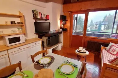 Image de 3ème étage, vue village, balcon, cheminée ou poêle à bois, parking, 59m², Le Grand Bornand