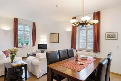 Image de Appartement \"Gut Rattelvitz - Parterre West\" avec vue sur le lac, terrasse privée et Wi-Fi