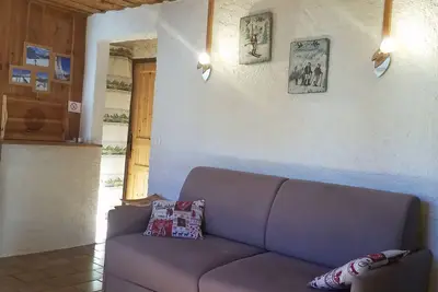 Image de Appartement 2 pièces avec jardin privatif, proche des pistes, Wi-Fi, parking, et navette gratuite
