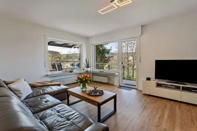 Image de Appartement de vacances \"Sauerlandrefugium\" avec vue sur les montagnes, terrasse privée et Wi-Fi