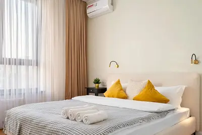 Image de Cozy Business class apartment. 5 minutes to the biggest shopping mall in Almaty!