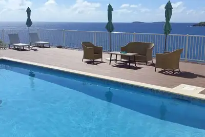 Image de A true oceanfront villa with amazing sunsets and pool. Very nice location.
