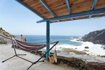 Image de Maison de vacances 'Casa Cueva El Pozo' avec vue sur la mer, terrasse privée et jardin privé