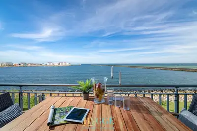 Image de Hygge Lodge 18 am Strand - Ferienwohnung Lodge 18 Meerblick/balkon/strand