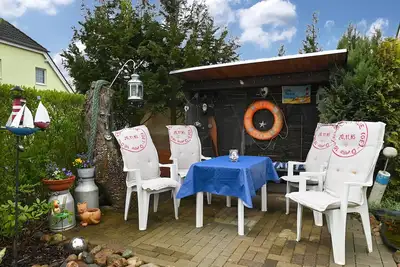 Image de Appartement 'Ferienwohnung KĂĽstenstĂĽbchen Gruse' avec terrasse, jardin et Wi-Fi