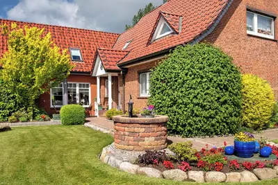 Image de Appartement \"Simonsen\" avec terrasse séparée, jardin partagé et Wi-Fi