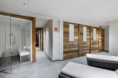 Chalet centre Megève avec hammam et terrasse, 5 chambres en suite, proche commerces