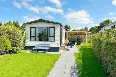 Image de A beautiful, brand new chalet with south-facing terrace, air conditioning, central heating and free Wifi.