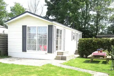 Image de Nice vintage chalet with free Wifi and a lovely garden! (sun all day + shaded areas)
