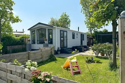 Image de A beautiful and brand new chalet with large terrace, fully fenced garden, private parking, central heating and free Wifi.