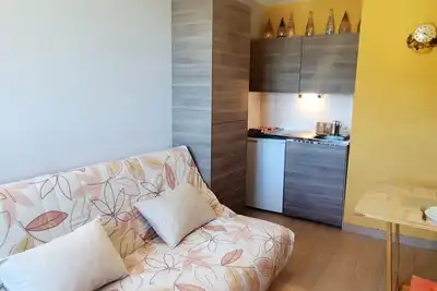 Image de Studio au pied des pistes avec Tv et casier à ski