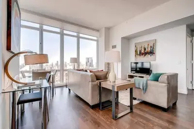 Image de Deluxe 2br | Full Kitchen + Washer/Dryer | Walk to Javits Center | by Gls