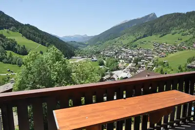 Image de Grand duplex familial  balcon exposition sud vue splendide village et montagne