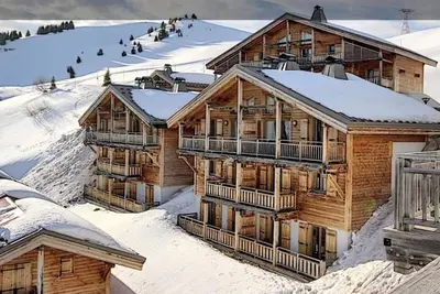 Image de Chalet Flaine avec 4 chambres et 4 Sdb dans une résidence hôteliere 4 étoiles