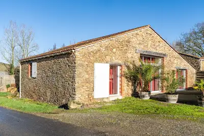 Image de Maison de vacances 'La Grange - Gîte Calme En Campagne' avec terrasse privée, jardin privé et Wi-Fi