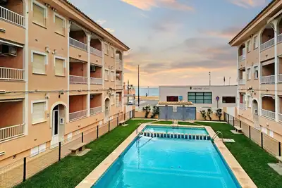 Appartement 'Mar Mediterrània Miramar' avec vue sur la mer, piscine partagée et Wi-Fi