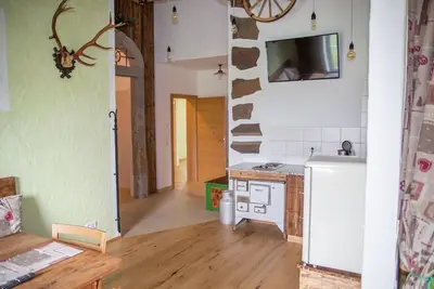 Image de Klimatisierte, im Almhüttenstil Gestaltete Ferienwohnung mit Vielen Extras