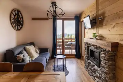 Image de Warme Wohnung im Herzen des Resorts