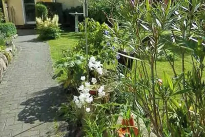 Image de Appartement 'Heidtschmidhof Gästehaus' avec terrasse privée, jardin partagé et Wi-Fi