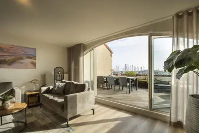 Image de Modern furnished flat directly at the marina and many (water) sports possibilities in the immediate vicinity.