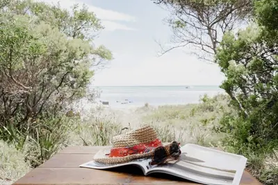 Image de The Leaning Tree - Little blue beach house and beach-box on the bay