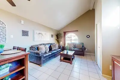 Gated-entry condo with central location, central Ac, & private W/D