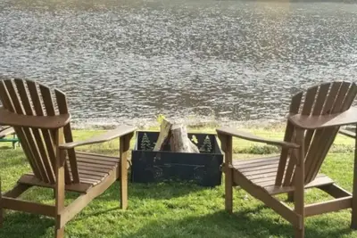 Image de River Cottage w 2 Story covered deck w/ 2 firepits, Coffee bar & outdoor Tv area