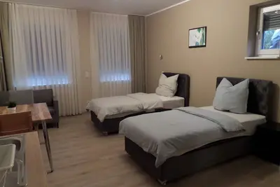 Image de Appartement mit Getrennten Betten