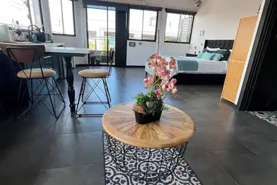 Image de Oasis Loft 5min from Sjo airport cozy and comfy fully equipment down town A/C