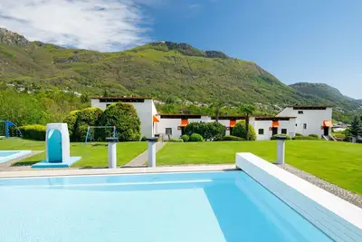 Image de Villaggio Sureggio - App. C7 by Interhome