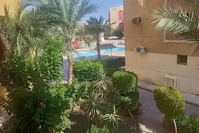 Image de An apartment with 2 big swimming pools and garden, close to the airport
