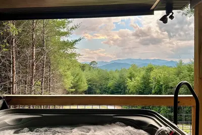 Sunset view, dog friendly, romantic getaway.