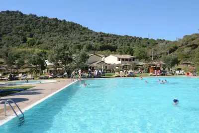 Image de Appartement d´hôtel avec climatisation et piscine extérieure
