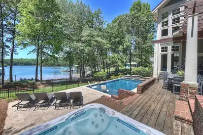 Image de Pool, Swim Dock, Hot Tub & Game Room | Miller Nicholson Design | Boathouse Cove