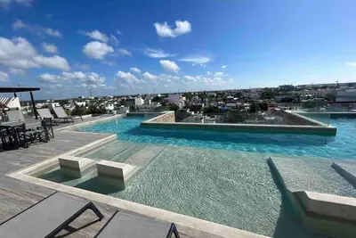 Image de Luxueux Condo Studio à 5 Minutes de la Plage