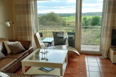 Image de Die Geschmackvoll Eingerichtete Ferienwohnung hat Einen Wunderschönen Blick auf den Conventer See und das Naturschutzgebiet