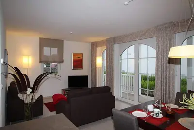 Image de Sonnige 3 Zimmer Ferienwohnung mit Terrasse und Garten nur 250 m zum Strand