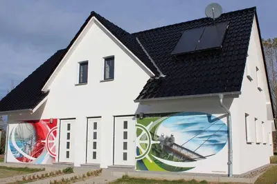 Image de Das Moderne Ferienhaus \" Steuerbord \" Bietet Platz für Max. 7 Personen. Es ist Ideal für die Familie mit Kindern, Denn es Verfügt U. a. Über 2 Duschbäder