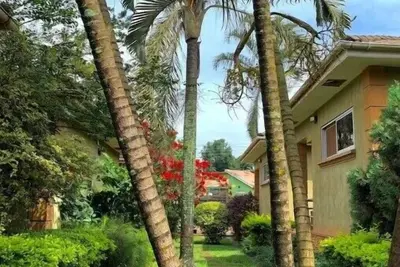 Quiet and peaceful hidden gem surrounded by lush greenery and vibrant flowers. \n