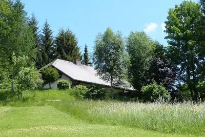 Image de Maison de vacances 'Amadeus Black Forest Mountain' avec vue montagne, terrasse privée et Wi-Fi