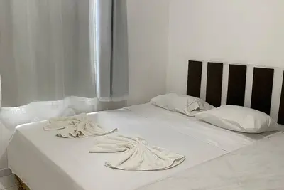 Image de Kitnet. quarto com Banheiro e Cozinha